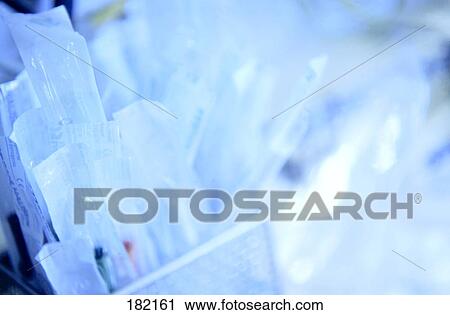 Close-up of packed syringes in container View Large Photo Image Stock Image - Close-up of packed syringes in container . Fotosearch