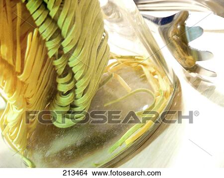 Picture - Close-up of pasta noodles in jar . Fotosearch