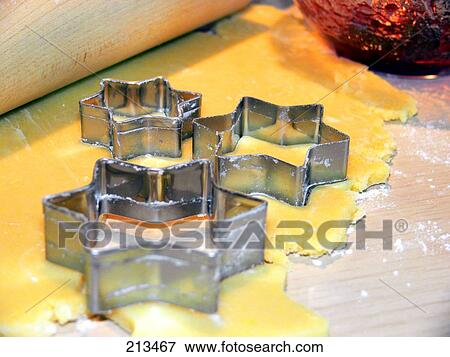 Close-up of pastry cutters on dough View Large Photo Image Stock Photo - Close-up of pastry cutters on dough . Fotosearch