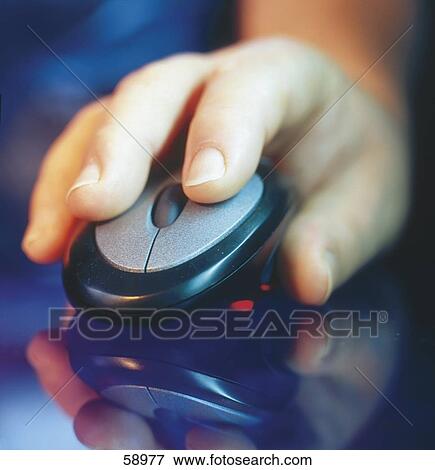 Close-up of person's hand using computer mouse View Large Photo Image Stock Photo - Close-up of person's hand using computer mouse . Fotosearch