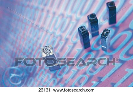 Stock Image - Close-up of printing blocks on binary codes . Fotosearch
