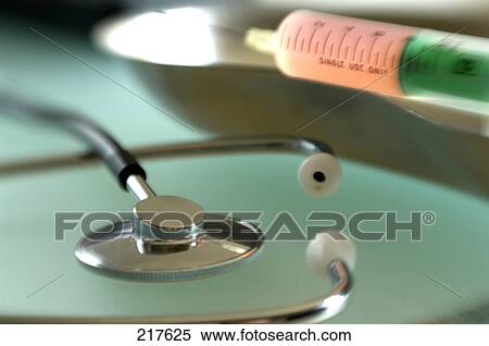 Close-up of stethoscope and syringe View Large Photo Image Stock Photography - Close-up of stethoscope and syringe . Fotosearch