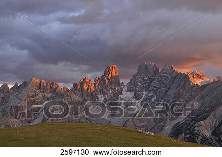 Clouds over mountains, Cristallo, Trentino-Alto Adige, Italy View Large Photo Image Stock Image - Clouds over mountains, Cristallo, Trentino-Alto Adige, Italy . Fotosearch