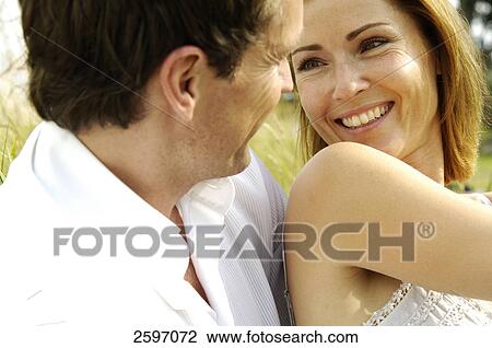 Couple facing each other View Large Photo Image Stock Image - Couple facing each other . Fotosearch