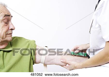 Doctor giving injection to patient View Large Photo Image Stock Image - Doctor giving injection to patient . Fotosearch