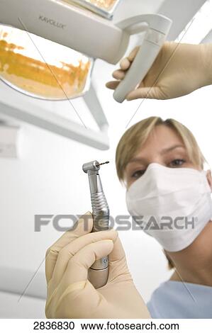 Stock Image - Female dental assistant . Fotosearch