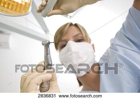 Female dental assistant View Large Photo Image Stock Image - Female dental assistant . Fotosearch