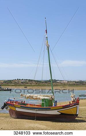 Stock Image - Fishing boat, Alvor, Algarve, Portugal . Fotosearch