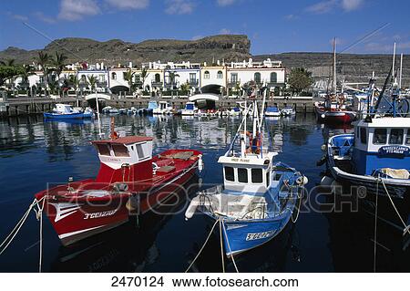 Fishing boats at harbor, Puerto de Mogan, Gran Canaria, Canary Islands, Spain View Large Photo Image Picture - Fishing boats at harbor, Puerto de Mogan, Gran Canaria, Canary Islands, Spain . Fotosearch