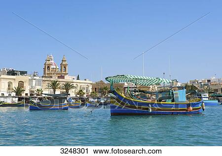 Stock Image - Fishing boats, Marsaxlokk, Malta . Fotosearch