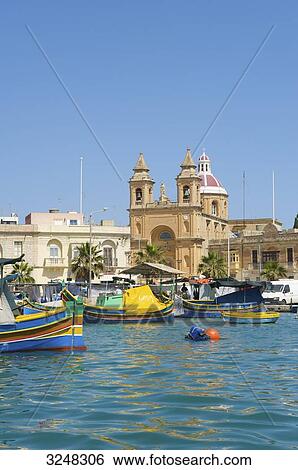 Fishing boats, Marsaxlokk, Malta View Large Photo Image Stock Photograph - Fishing boats, Marsaxlokk, Malta . Fotosearch
