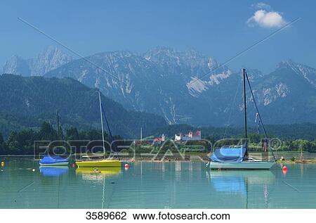 Stock Image - Forggensee and Hohes Schloss, Fuessen, Bavaria, Germany, Europe . Fotosearch