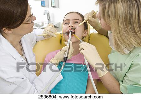 Picture - Girl at dentist . Fotosearch