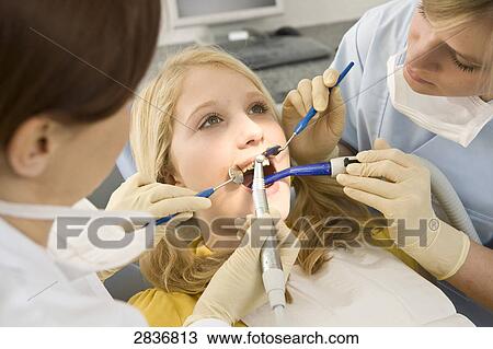 Girl at dentist View Large Photo Image Stock Image - Girl at dentist . Fotosearch