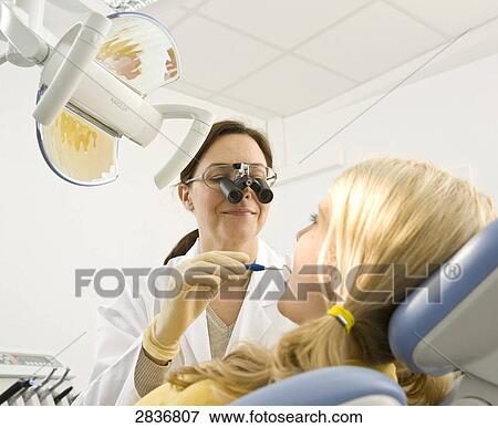 Stock Photo - Girl at dentist . Fotosearch