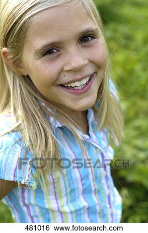 Girl smiling at camera View Large Photo Image Stock Photograph - Girl smiling at camera . Fotosearch