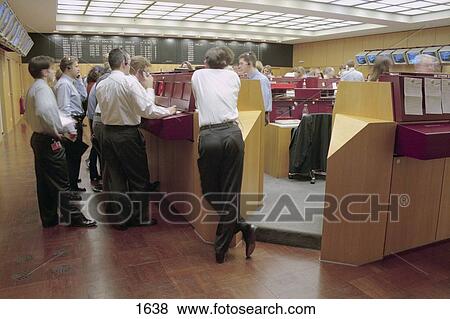 Group of people in stock exchange building, Frankfurt, Germany View Large Photo Image Stock Photo - Group of people in stock exchange building, Frankfurt, Germany . Fotosearch