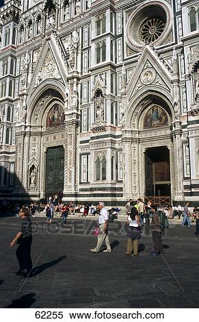 Stock Photography - Group of people walking in front church, Campanile, Florence, Tuscany, Italy, Europe . Fotosearch