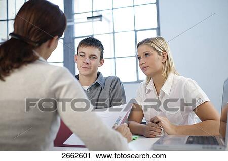 Group of three people doing job interview View Large Photo Image Stock Image - Group of three people doing job interview . Fotosearch