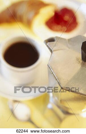 High angle view of an espresso with a croissant View Large Photo Image Picture - High angle view of an espresso with a croissant . Fotosearch