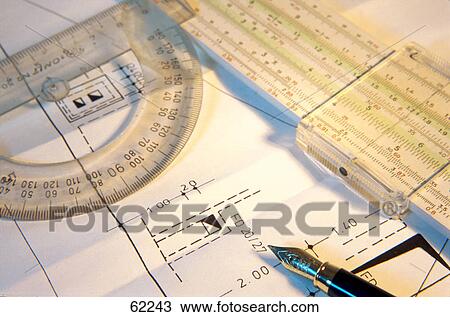 Stock Image - High angle view of architect's plan for constructor . Fotosearch