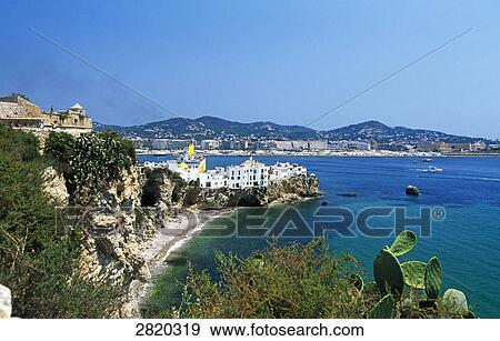 Stock Photo - High angle view of buildings at waterfront, Dalt Vila, Ibiza Town, Ibiza, Balearic Islands, Spain . Fotosearch