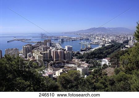 High angle view of buildings in city, Malaga, Andalusia, Spain View Large Photo Image Stock Image - High angle view of buildings in city, Malaga, Andalusia, Spain . Fotosearch
