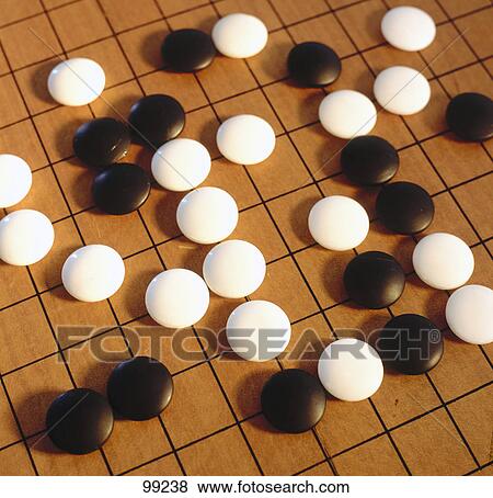 Stock Photo - High angle view of chess pieces on chessboard, China, Asia . Fotosearch