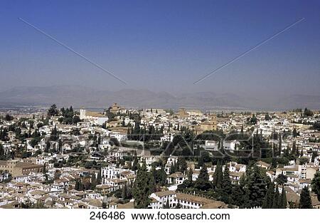 Stock Photograph - High angle view of city, Granada, Andalusia, Spain . Fotosearch
