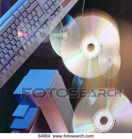 High angle view of computer keyboard and CDs View Large Photo Image Picture - High angle view of computer keyboard and CDs . Fotosearch