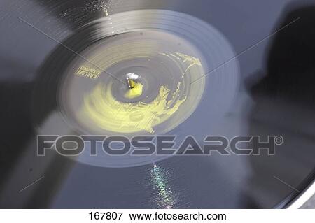Stock Photo - High angle view of record . Fotosearch