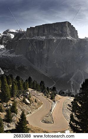 Stock Photo - High angle view of serpentine road running through landscape, Alto Adige, South Tyrol, Italy . Fotosearch