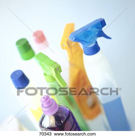 Stock Image - High angle view of spray bottles . Fotosearch