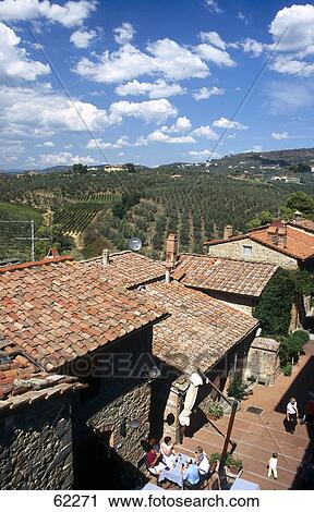 High angle view of tourists at outdoor cafe, Vinci, Tuscany, Italy View Large Photo Image Stock Image - High angle view of tourists at outdoor cafe, Vinci, Tuscany, Italy . Fotosearch