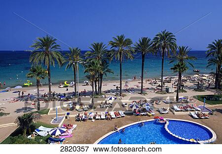 High angle view of tourists on beach, Playa den Bossa, Ibiza, Balearic Islands, Spain View Large Photo Image Stock Photo - High angle view of tourists on beach, Playa den Bossa, Ibiza, Balearic Islands, Spain . Fotosearch