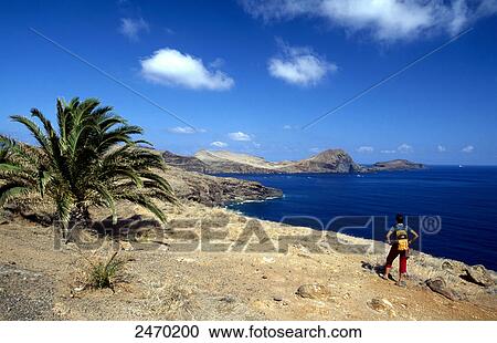Hiker at coast, Ponta De Sao Lourenco, Madeira, Portugal View Large Photo Image Stock Image - Hiker at coast, Ponta De Sao Lourenco, Madeira, Portugal . Fotosearch