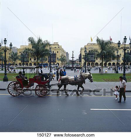 Horse cart moving on road, Plaza-De-Armas, Cuzco, Cusco Region, Peru View Large Photo Image Stock Photo - Horse cart moving on road, Plaza-De-Armas, Cuzco, Cusco Region, Peru . Fotosearch