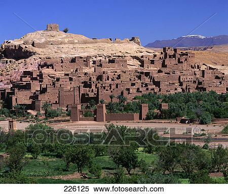 Stock Photography - Houses in village on arid landscape, Ait Benhaddou, Morocco . Fotosearch