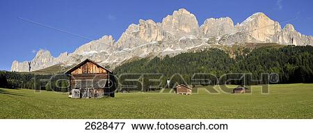 Stock Photo - Huts on rural landscape, Italy . Fotosearch