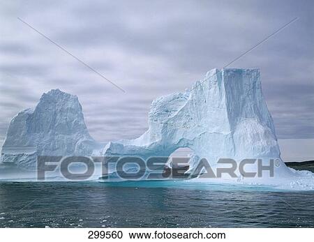 Iceberg floating in ocean, Greenland View Large Photo Image Stock Image - Iceberg floating in ocean, Greenland . Fotosearch