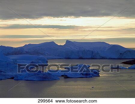Picture - Icebergs at dusk, Ilulissat, Greenland . Fotosearch