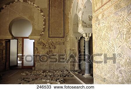 Stock Image - Interiors of ruined castle, Portico de Medina Azahara, Medina Azahara, Cordoba, Andalusia, Spain . Fotosearch