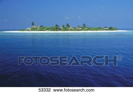 Stock Image - Island in ocean, Maldives . Fotosearch