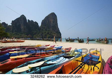Stock Image - Kayaks at beach, Rai Leh West Beach, Krabi, Thailand . Fotosearch