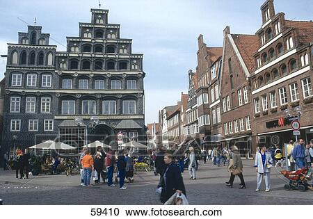 Large group of people walking in street, Luneburg, Saxony, Germany, Europe View Large Photo Image Stock Image - Large group of people walking in street, Luneburg, Saxony, Germany, Europe . Fotosearch
