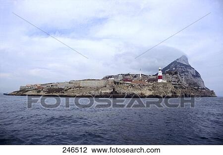 Stock Image - Lighthouse on island, Andalusia, Spain . Fotosearch
