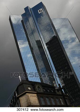 Stock Image - Low angle view of building against overcast sky . Fotosearch