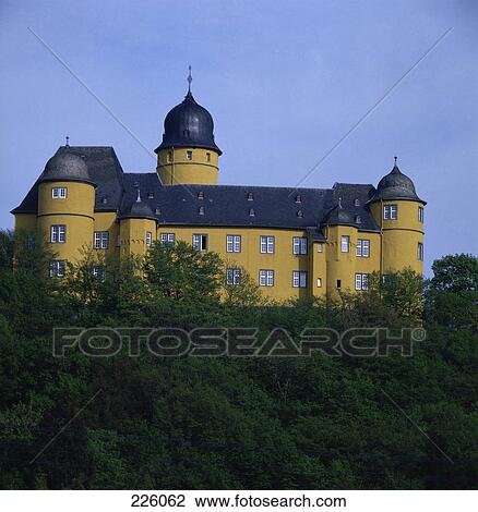 Low angle view of castle surrounded by forest, Montabaur Castle, Montabaur, Westerwald, Rhineland-Palatinate, Germany View Large Photo Image Stock Image - Low angle view of castle surrounded by forest, Montabaur Castle, Montabaur, Westerwald, Rhineland-Palatinate, Germany . Fotosearch