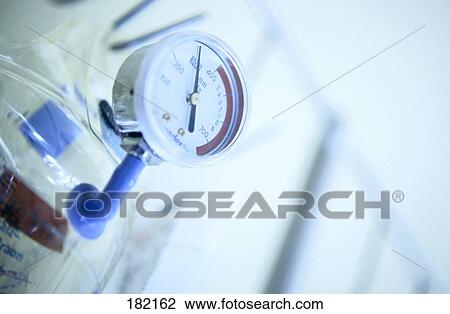 Stock Image - Low angle view of pressure gauge . Fotosearch
