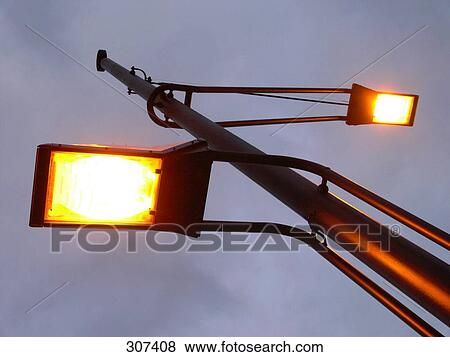 Low angle view of street lights View Large Photo Image Stock Photo - Low angle view of street lights . Fotosearch